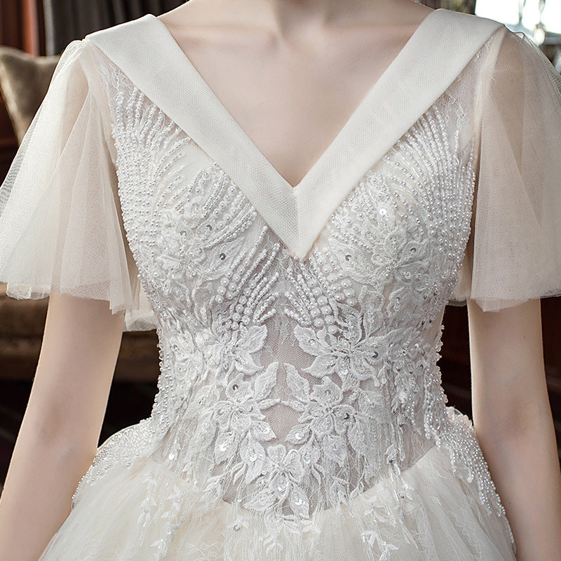 Nine Seven V-Neck Appliques Short Sleeve Pearls A-Line Wedding Dress