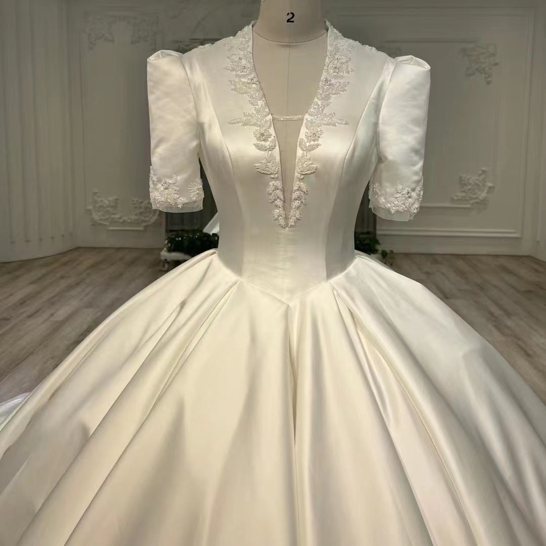 Nine Seven Appliques Plunging V-Neck Half Sleeves Ball Grown Satin Court Wedding Dress
